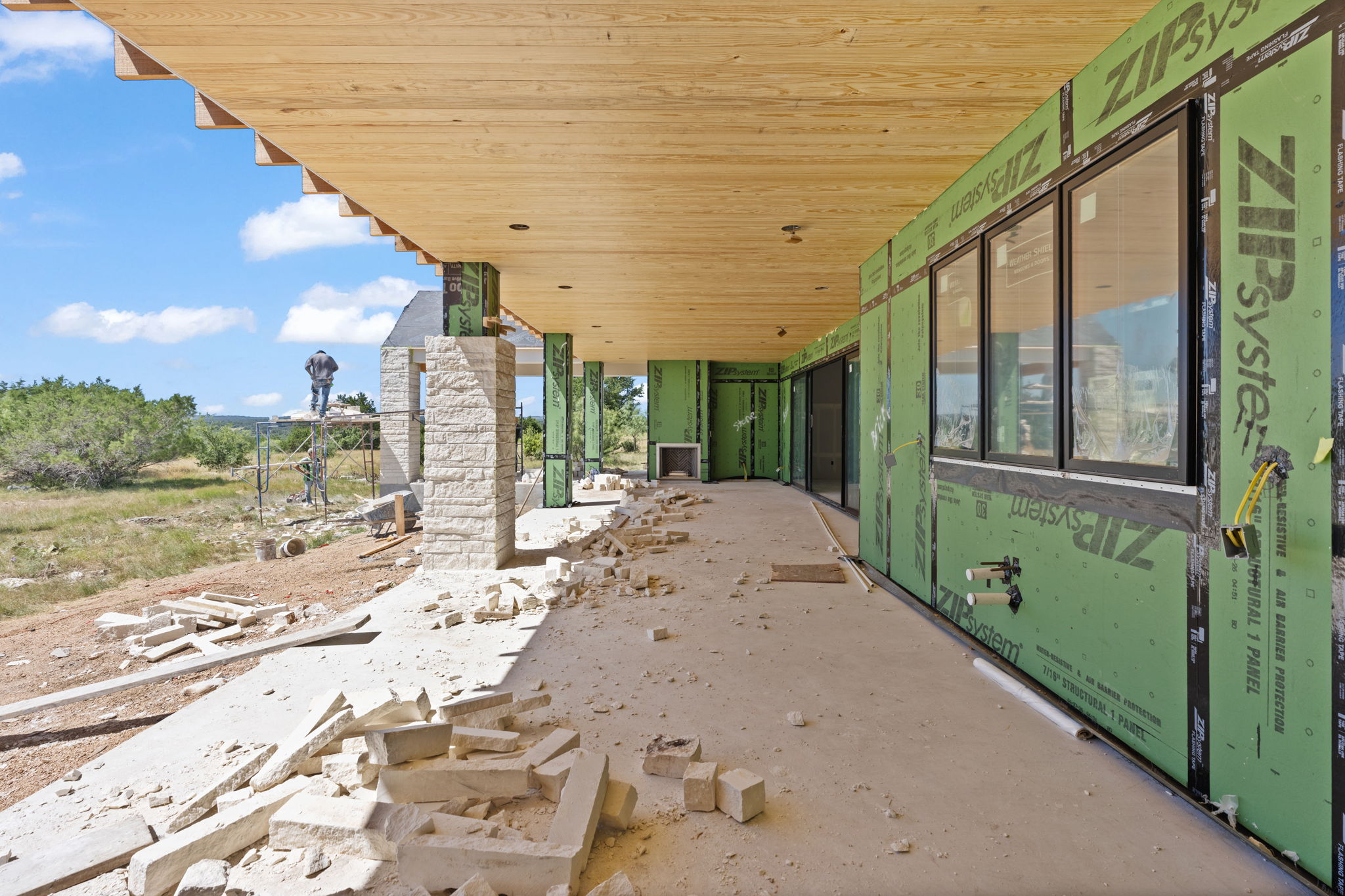 The deep covered terrace at Beautyberry House during construction