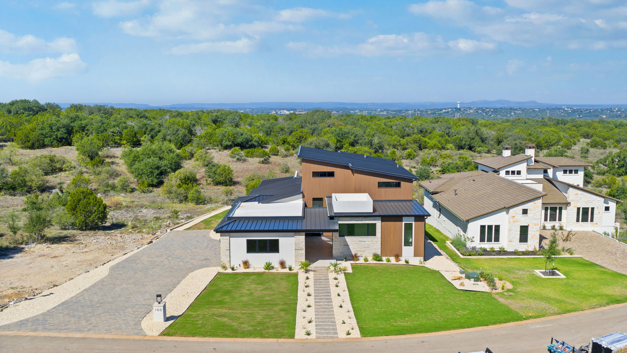 Aerial view of the completed Lookout home and landscaped grounds in Horseshoe Bay